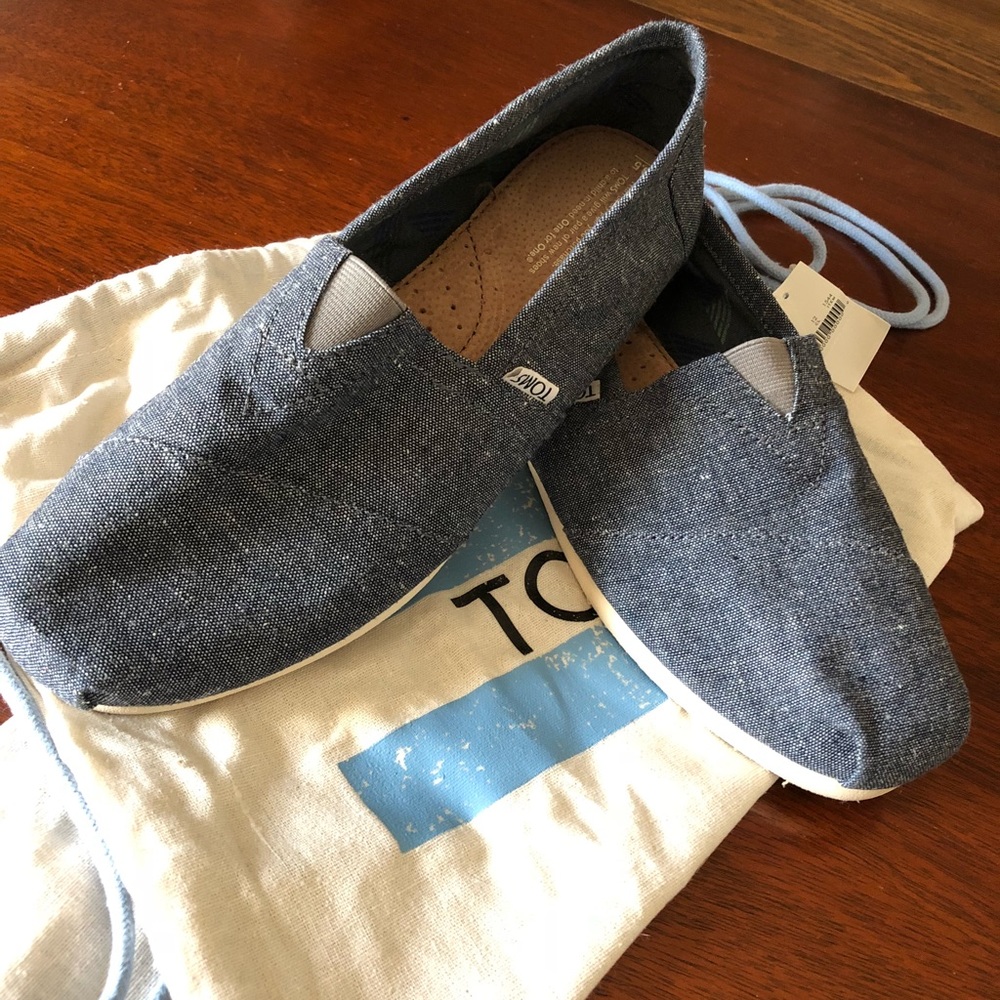 Men’s TOMS, denim in color.